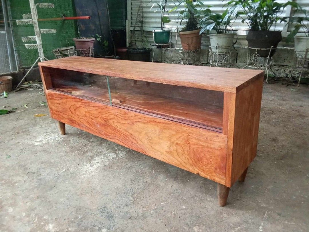 Old TV Stand (Category: TV Consoles) located in Rizal. Submitted by mommykiee (Listing ID 1460512817, Image 2). Description: Old TV stand Made of solid narra wood Size: L48 W10 H19inch. Stripped & varnished.