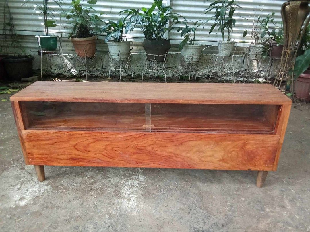 Old TV Stand (Category: TV Consoles) located in Rizal. Submitted by mommykiee (Listing ID 1460512817, Image 1). Description: Old TV stand Made of solid narra wood Size: L48 W10 H19inch. Stripped & varnished.