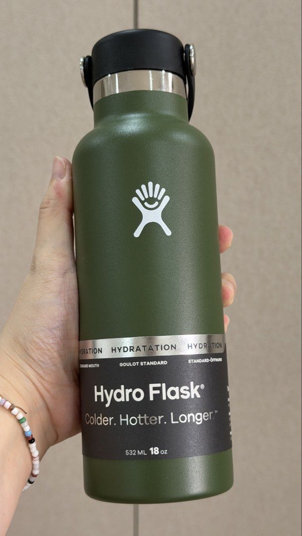 Olive green Hydroflask 18oz / 532ml (Category: Water Bottles & Tumblers) located in San Juan City. Submitted by rackysabido (Listing ID 1460579886, Image 1). Description: - complete with box and info card - never used - RFS: extra tumbler.