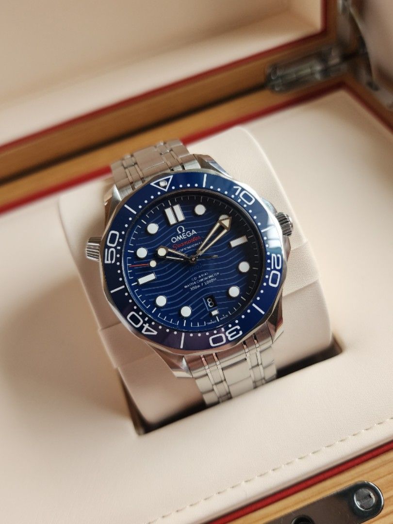 Omega Seamaster Co-Axial 300M Blue (Category: Men's Watches) located in Quezon City. Submitted by imchanggy (Listing ID 1460695482, Image 1). Description: Omega Seamaster Co-Axial 300M Blue ➡️258,800 9/10 condition Full set Comes with double wooden box, manual,cards and extra links *foreign AD - 2021 *Reference: 210.30.42.20.03.001 *Co-Axial escapement *Certified Master Chronometer *METAS approved Specs: Between lugs: 20 mm Lug to lug: 49.9 mm Th