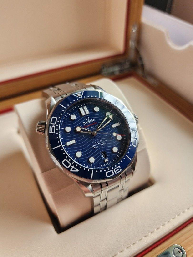 Omega Seamaster Co-Axial 300M Blue (Category: Men's Watches) located in Quezon City. Submitted by imchanggy (Listing ID 1460695482, Image 3). Description: Omega Seamaster Co-Axial 300M Blue ➡️258,800 9/10 condition Full set Comes with double wooden box, manual,cards and extra links *foreign AD - 2021 *Reference: 210.30.42.20.03.001 *Co-Axial escapement *Certified Master Chronometer *METAS approved Specs: Between lugs: 20 mm Lug to lug: 49.9 mm Th