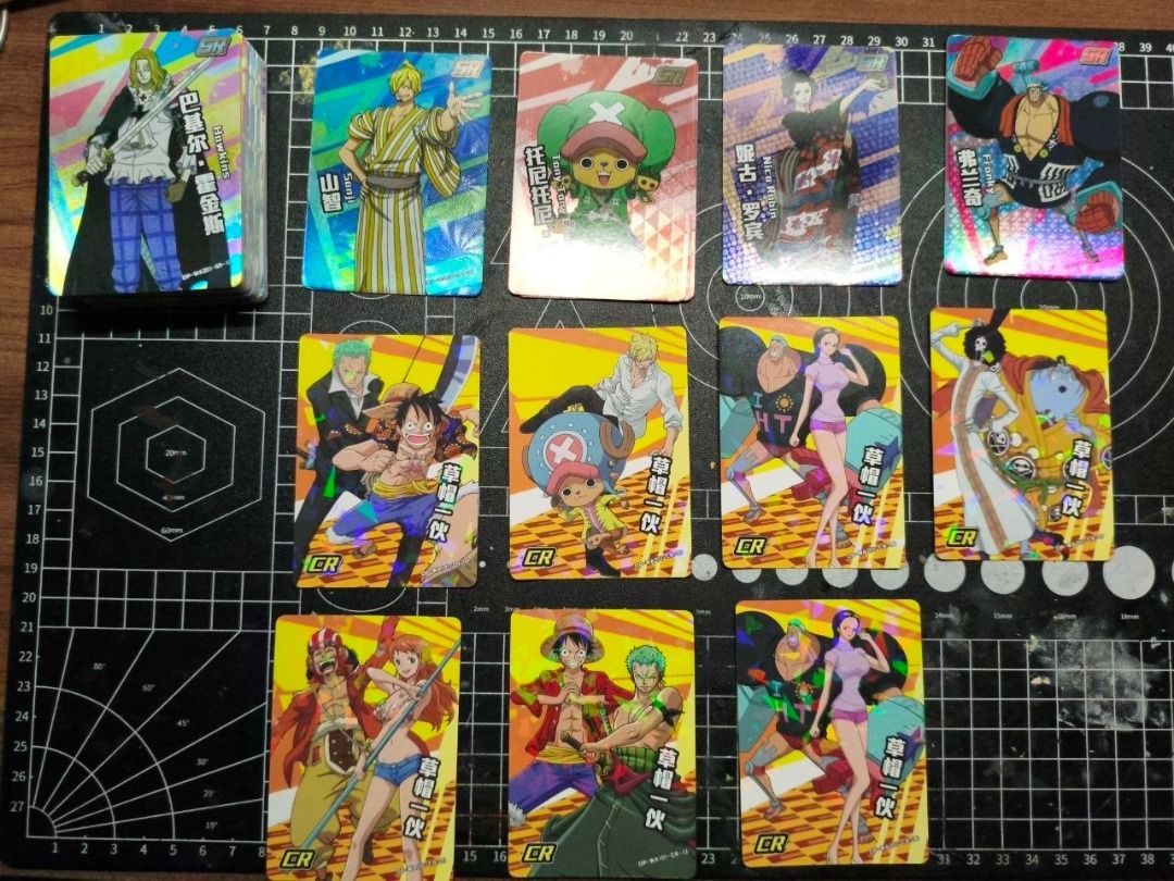 One Piece Collectible Cards (Category: Raw Singles) located in Manila. Submitted by johndaleoc27503 (Listing ID 1460672123, Image 1). Description: ✨ Includes SR and CR rarity cards 👒 Characters include Luffy, Zoro, Sanji, Chopper, Nico Robin, Franky, Brook, Boa Hancock, Nami, Usopp, and others 📦 12 cards total 💎 Includes several CR (Character Rare) and SR (Super Rare) cards 📸 Actual items shown in the photos.
