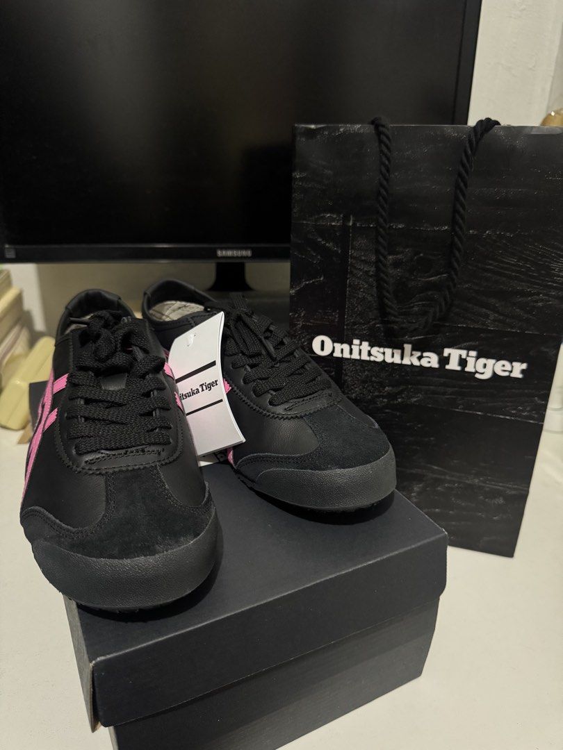 ONITSUKA TIGER MEXICO 66 (Category: Casual Shoes) located in Makati City. Submitted by angeliqueabardo (Listing ID 1460664953, Image 3). Description: ONITSUKA TIGER MEXICO 66 Color: Black/Dragon Fruit (Pink) US 8 | US WM 9.5 |UK 7 | 26CM Condition: Brand New with Tags and Original Box | Never Used Bought in Japan, complete with box and paper bag RFS: Bought the wrong size | too big.