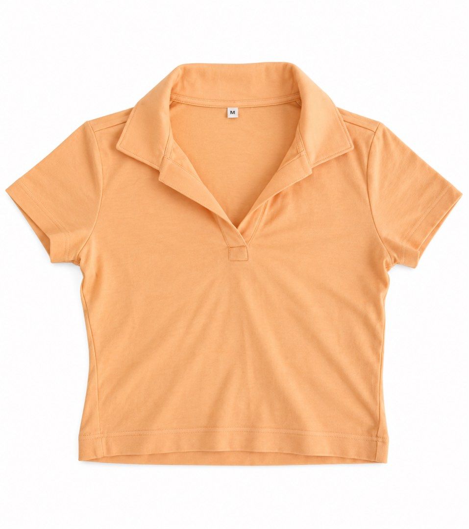 Orange Cropped Polo Shirt Size M (Category: Others Tops) located in Manila. Submitted by betterdaysstudio (Listing ID 1460547398, Image 1). Description: - Cute orange cropped polo shirt - Short sleeves with classic collar - Small button detail at neckline - Made of soft, breathable fabric - Versatile for casual or slightly dressed-up outfits - Easy to pair with jeans or skirts.