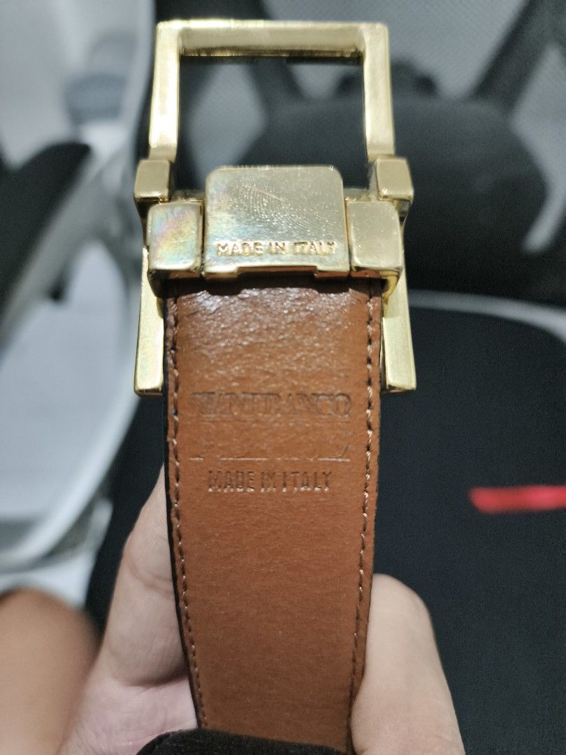 Original Ferre belt made in Italy (Category: Coats, Jackets and Outerwear) located in Tuguegarao City. Submitted by domzaiii (Listing ID 1460644936, Image 3). Description: There's a cut in the leather strap but it can be fixed.