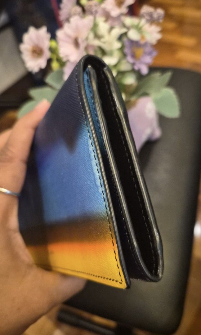 Original Paul Smith Long Bifold Wallet (Category: Wallets & Card Holders) located in Cabanatuan. Submitted by meyrasol (Listing ID 1460646595, Image 3). Description: may mga konting fading sa body excellent interior.