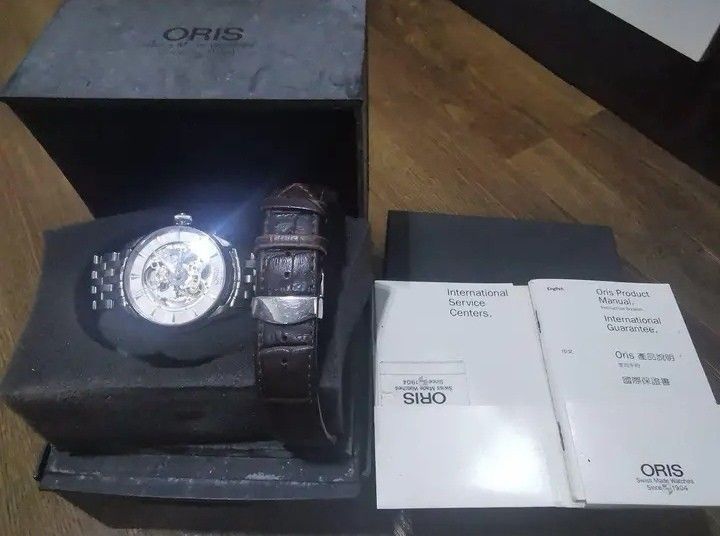 Oris Artelier Skeleton Automatic Watch (Category: Luxury Watches) located in Mandaluyong City. Submitted by tomfinds (Listing ID 1460544279, Image 2). Description: ORIS ARTELIER Skeleton Watch Authentic Automatic Semi-White Dial Two Bracelets (Original SS plus after market leather band) Seldom used With box, manual and paper Asking Price: 70k negotiable for sure buyers....may consider trade. RFS: Downsizing collection DM for more details. Thanks.