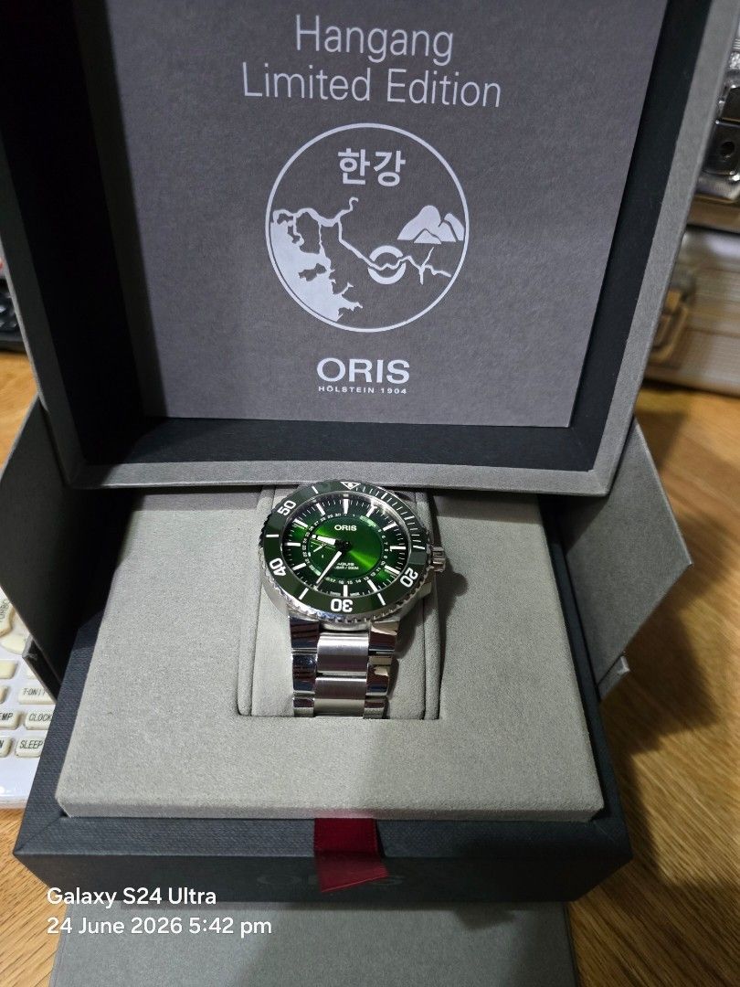Oris Hangang Limited Edition Automatic Watch Green Dial (Category: Luxury Watches) located in San Juan City. Submitted by pilatus17 (Listing ID 1460520495, Image 2). Description: - Oris Hangang Limited Edition Watch - Automatic Movement - Vibrant Green Dial - Stainless Steel Bracelet - Includes Original Box and Official Certificate - Limited Edition: 1764 of 2000 pieces - Perfect for Watch Collectors.