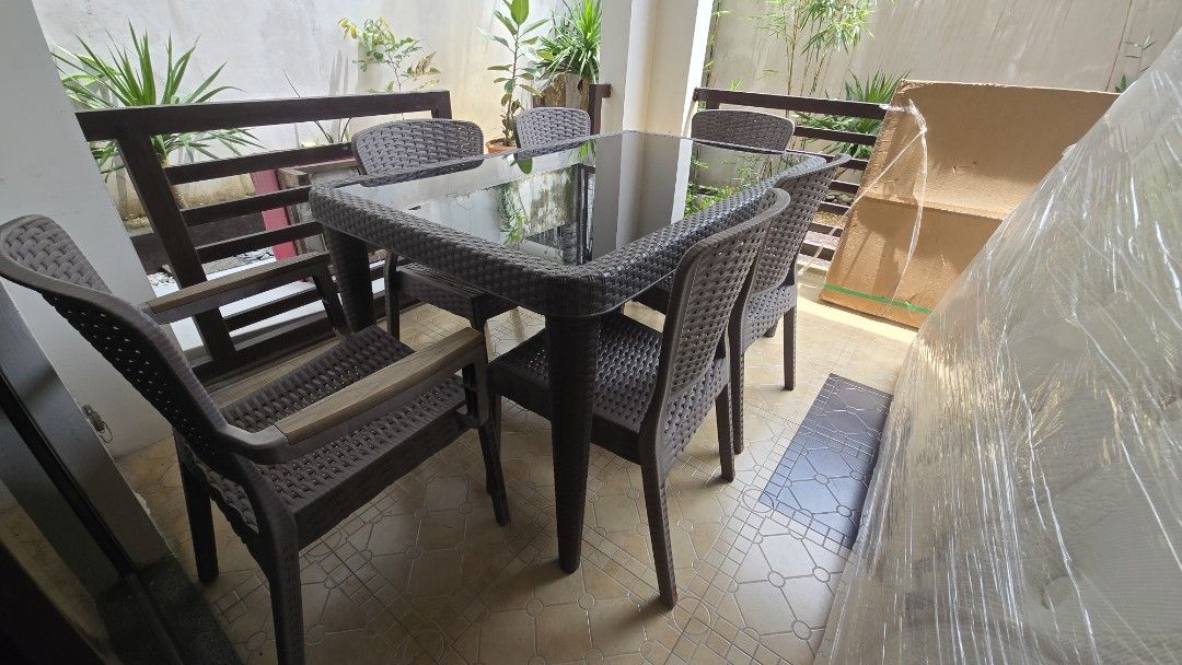 Outdoor dining patio set table (Category: Tables & Sets) located in Paranaque City. Submitted by lowwg (Listing ID 1460673414, Image 2). Description: Stylish 6-seater outdoor dining set with a sleek glass-top table and comfortable rattan-style chairs. Perfect for your patio or balcony. Ready for a new home! if interested message here Paranaque Area asking price 15k slightly negotiable.