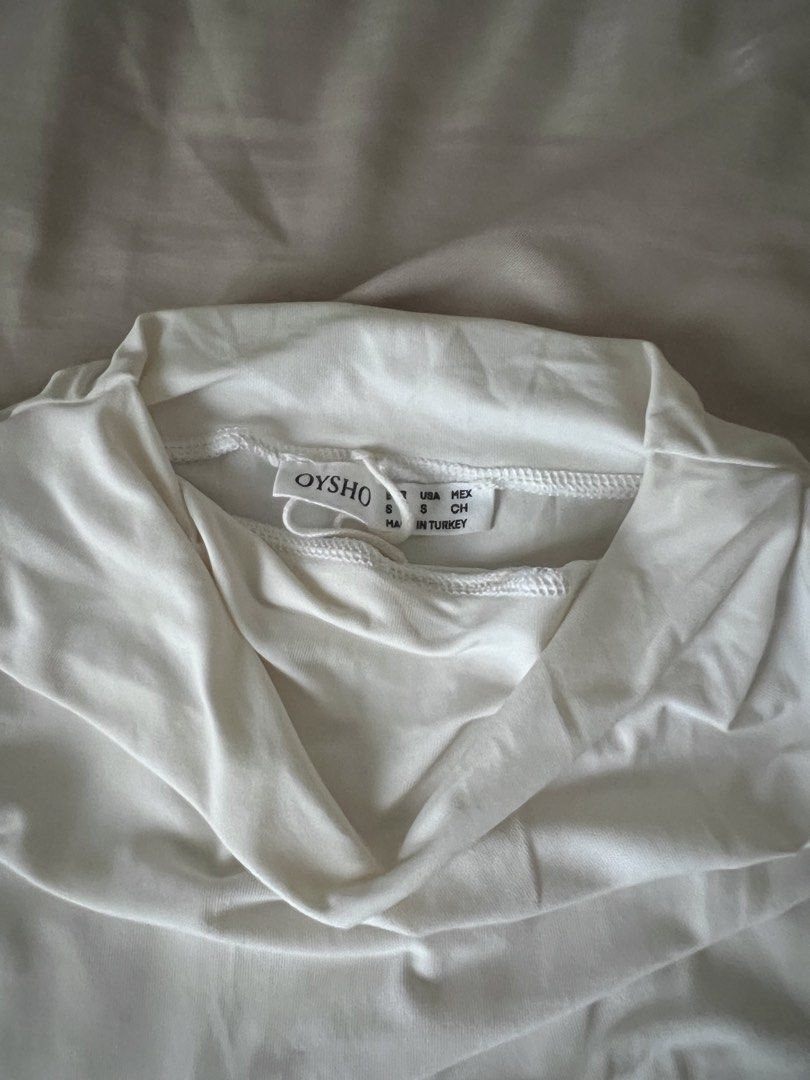oysho white top (Category: Sleeveless) located in Quezon City. Submitted by luckysellsxoxo (Listing ID 1460590583, Image 2). Description: - can dress up or down - bought from SG - used once.