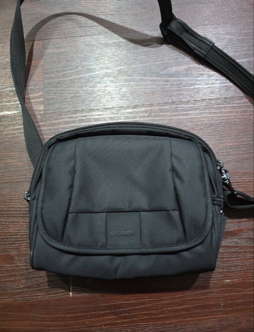 Pacsafe Black Crossbody Bag (Category: Sling Bags) located in Manila. Submitted by douglassss24 (Listing ID 1460533705, Image 1). Description: - Black Pacsafe crossbody bag - Adjustable strap - Secure zipper closure - Ample space for essentials - Durable material - Ideal for travel and everyday use.