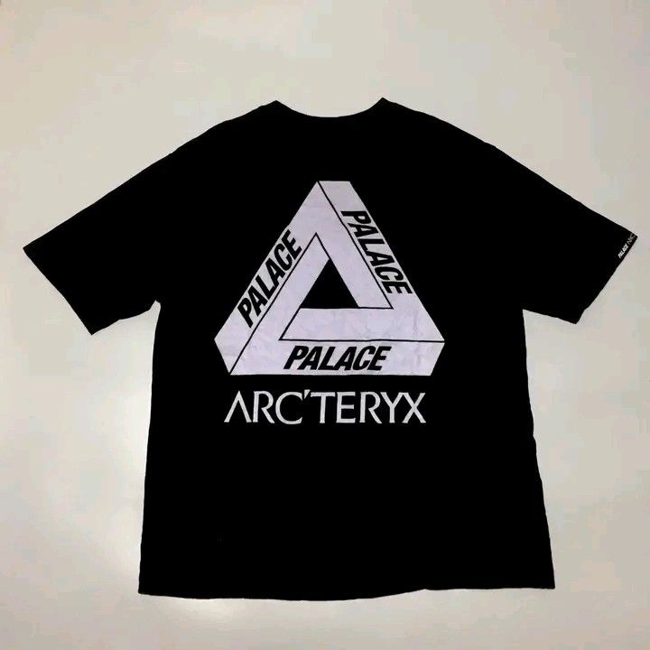Palace Arc'teryx Black Tee (Category: Tshirts & Polo Shirts ) located in Calbayog City. Submitted by taking-candy.ph (Listing ID 1460657145, Image 1). Description: - Authentic Palace x Arc'teryx collaboration t-shirt - Color: Black - Iconic Palace triangle logo prominently displayed on the back - Subtle Arc'teryx and Palace logos on the chest - 'Palace Arc'teryx' text detail on the sleeve - A must-have for collectors and fans of both brands.