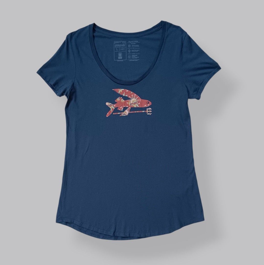 Patagonia Flying Fish Shirt (Category: Luxury Apparel) located in Davao. Submitted by thriftbuddy (Listing ID 1460668439, Image 1). Description: size XL width 19" length 29" verygood condition 9/10 colorate 2 tiny pinholes see photos for details still presentable to wear.