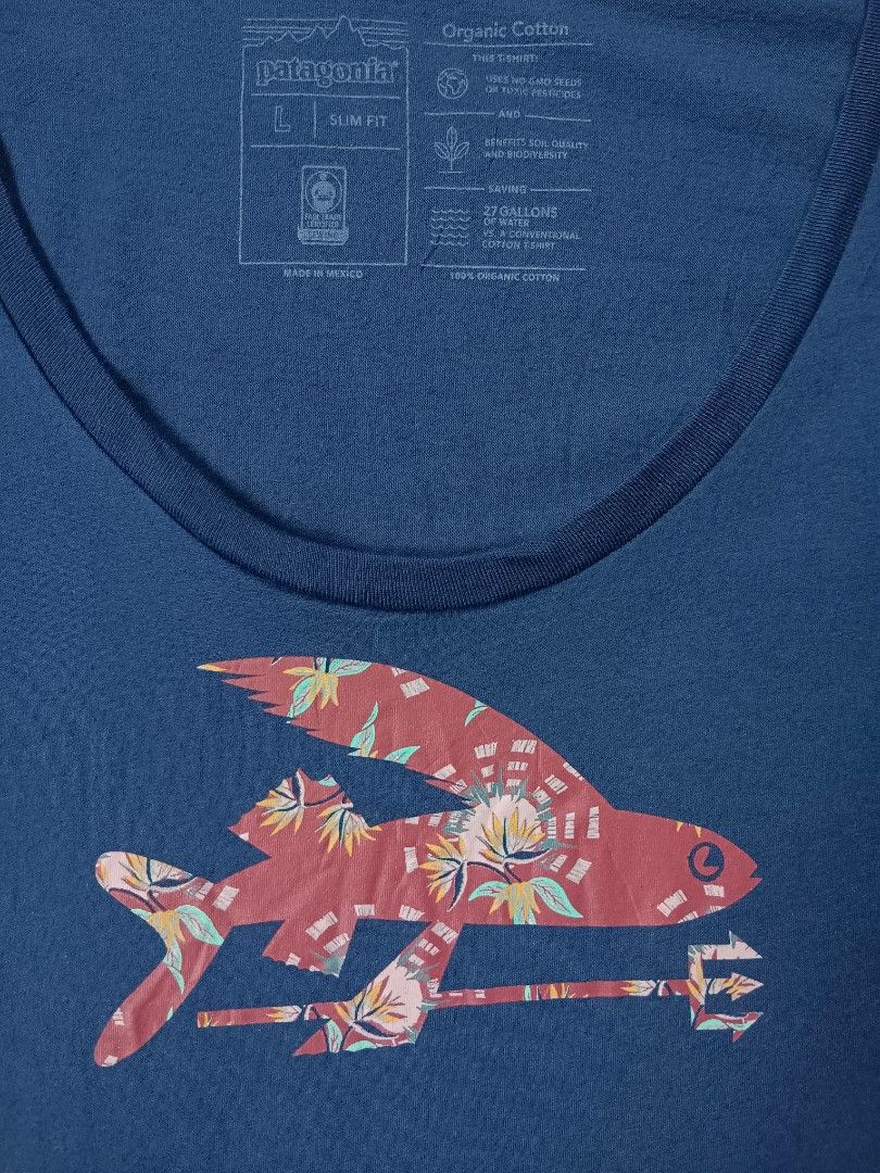 Patagonia Flying Fish Shirt (Category: Luxury Apparel) located in Davao. Submitted by thriftbuddy (Listing ID 1460668439, Image 2). Description: size XL width 19" length 29" verygood condition 9/10 colorate 2 tiny pinholes see photos for details still presentable to wear.