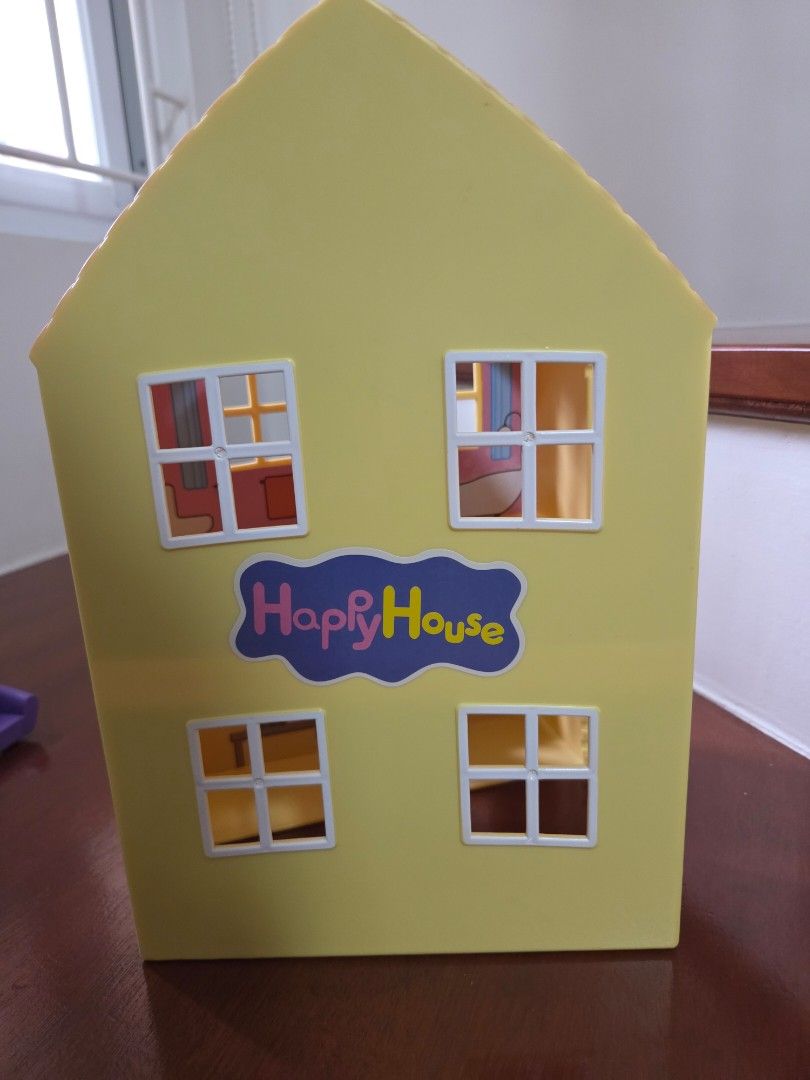 Peppa Pig Toy House (Category: Kids Toys) located in Taguig. Submitted by chrisypv (Listing ID 1460587230, Image 2). Description: -Peppa Pig Happy House toy house -With free random characters (used) - Folds open to reveal interior - Includes furniture pieces like bathtub and chair - Encourages imaginative play Pickup care of buyer. Taguig pickup..