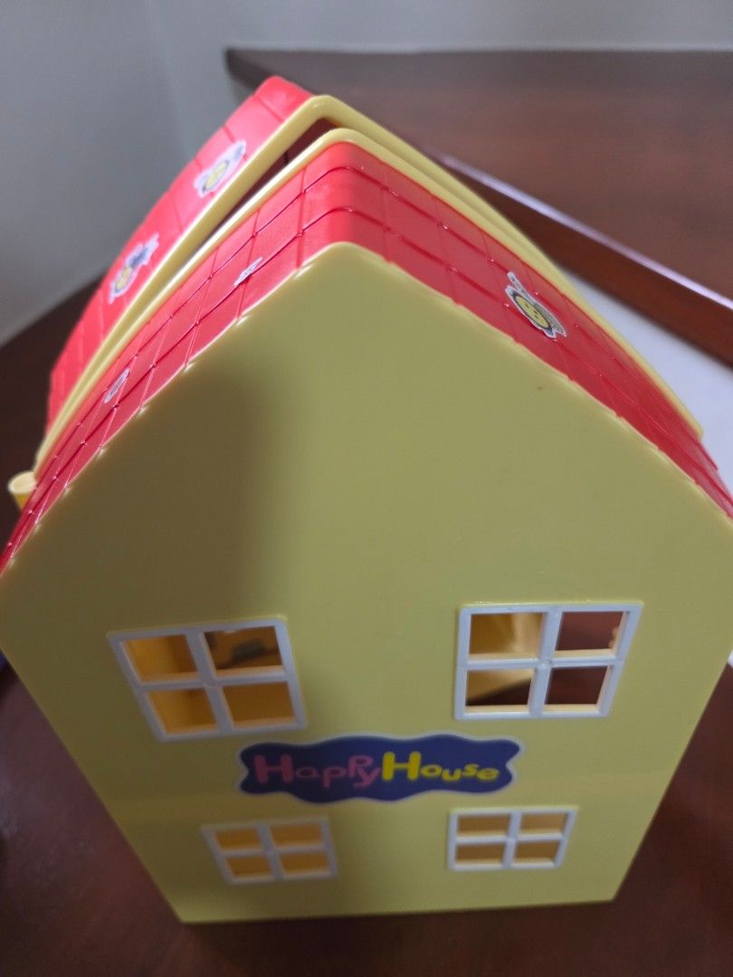 Peppa Pig Toy House (Category: Kids Toys) located in Taguig. Submitted by chrisypv (Listing ID 1460587230, Image 3). Description: -Peppa Pig Happy House toy house -With free random characters (used) - Folds open to reveal interior - Includes furniture pieces like bathtub and chair - Encourages imaginative play Pickup care of buyer. Taguig pickup..