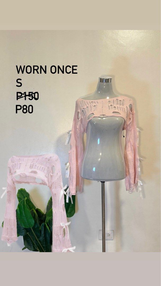 Pink Distressed Knit Cropped Sweater Size S (Category: Longsleeves) located in Manila. Submitted by morihee_ (Listing ID 1460612024, Image 1). Description: - Pink knit cropped sweater - Size S-XS - Features cut-out sleeves with ribbon details - Off-shoulder design - Worn only once - Perfect for songkran, party, summer.