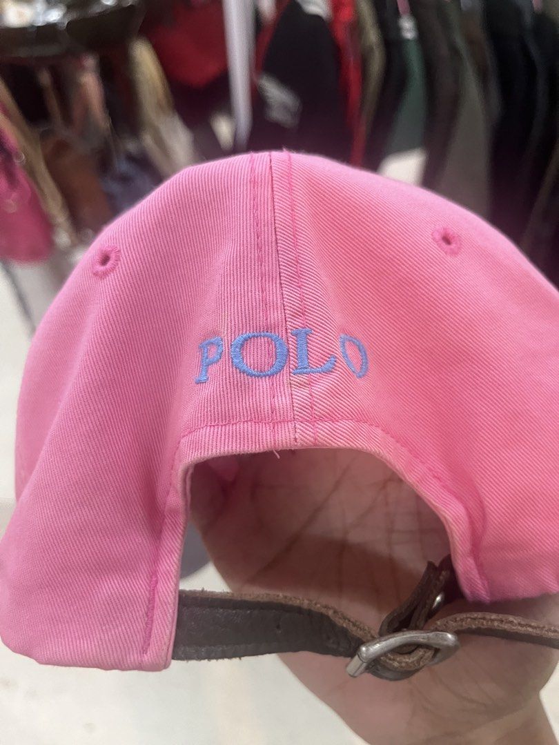 Pink Polo Ralph Lauren Cap (Category: Caps & Hats) located in Manila. Submitted by jortexxd (Listing ID 1460627872, Image 3). Description: - Classic pink baseball cap from Polo Ralph Lauren. - Features iconic light blue embroidered polo player logo on the front. - 'POLO' embroidered on the back. - Adjustable strap with buckle closure. - Made from 100% cotton. - One size fits most..