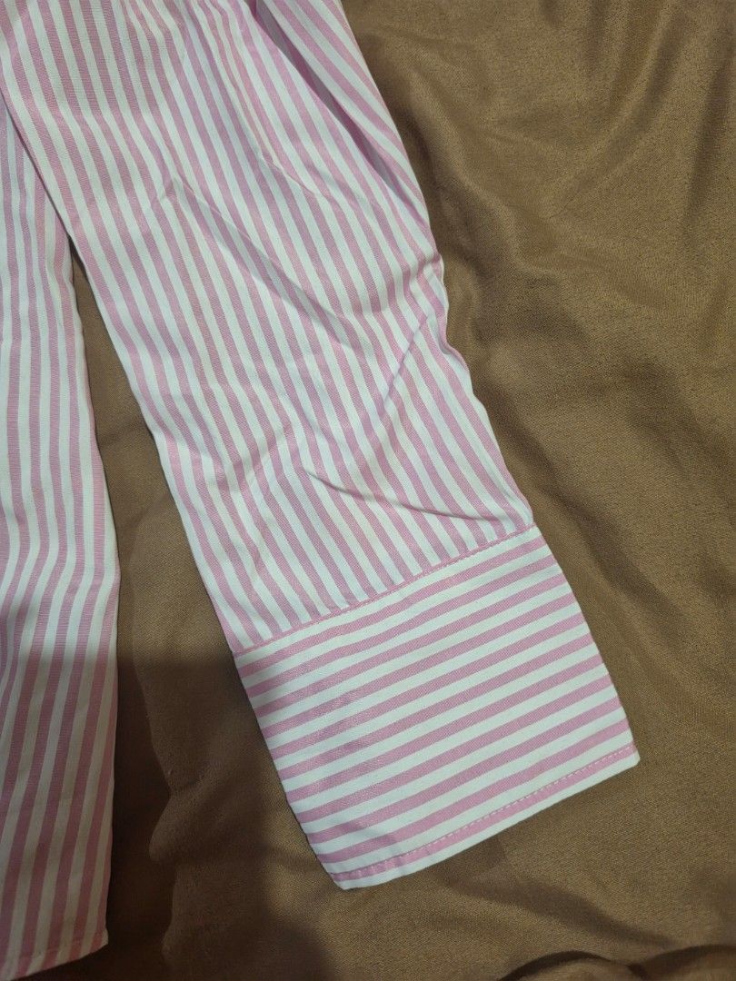 Pink Striped Long Sleeve (Category: Longsleeves) located in Malabon City. Submitted by lpzangie (Listing ID 1460596987, Image 3). Description: with washable stain.