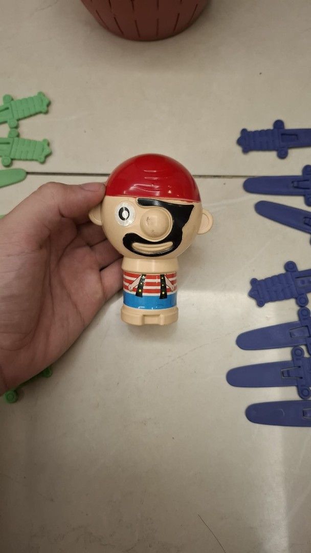 Pirate Lucky Stab Barrel Game (Category: Board Games & Puzzles) located in Caloocan City. Submitted by epicmoon-9beaf2 (Listing ID 1460617416, Image 2). Description: - Exciting pirate lucky stab game! - Insert swords and see who makes the pirate pop out! - Includes red and blue swords. - Perfect for parties and family game nights. - Simple to set up and play..