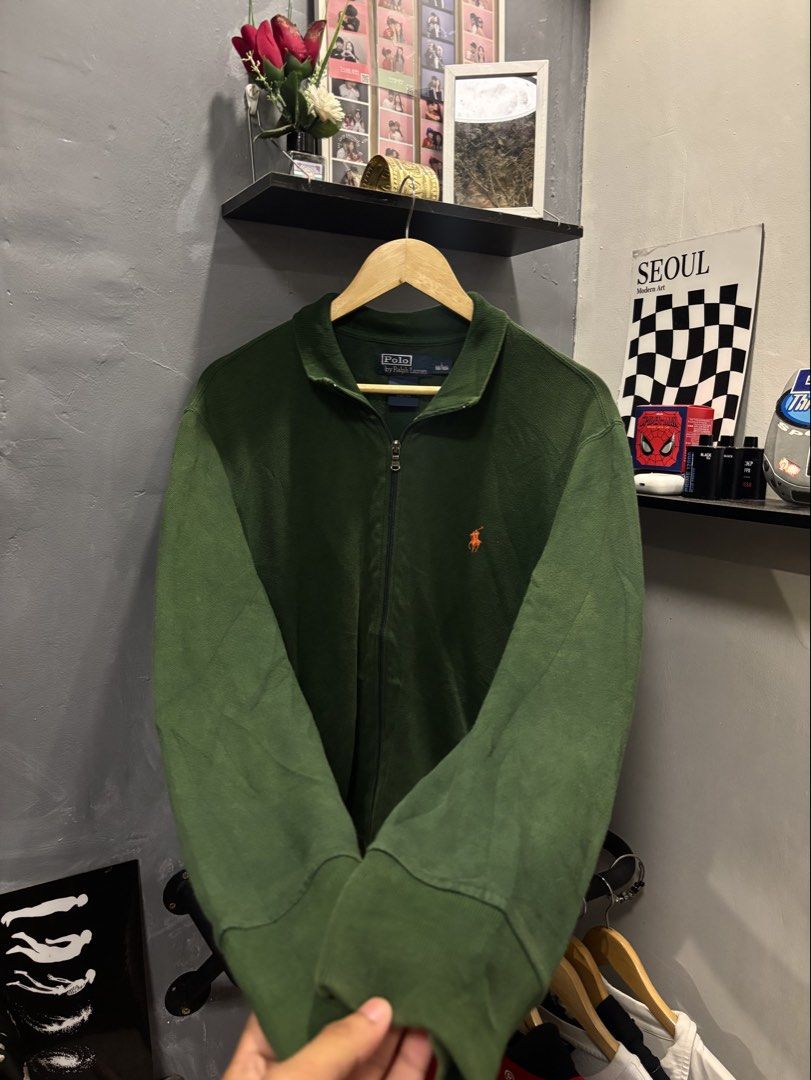 Polo by Ralph Lauren Green Zip-Up Jacket (Category: Coats, Jackets and Outerwear) located in Paranaque City. Submitted by mrthingsman (Listing ID 1460645983, Image 3). Description: Polo by Ralph Lauren Green Zip-Up Jacket 🧥 🌲 Size Large on tag🏷️ Dimension: •Width -22inches •Length -28inches Best fit Med to Xlarge Good size for men🫡 Great condition over all✨ Super Minimal discoloration.
