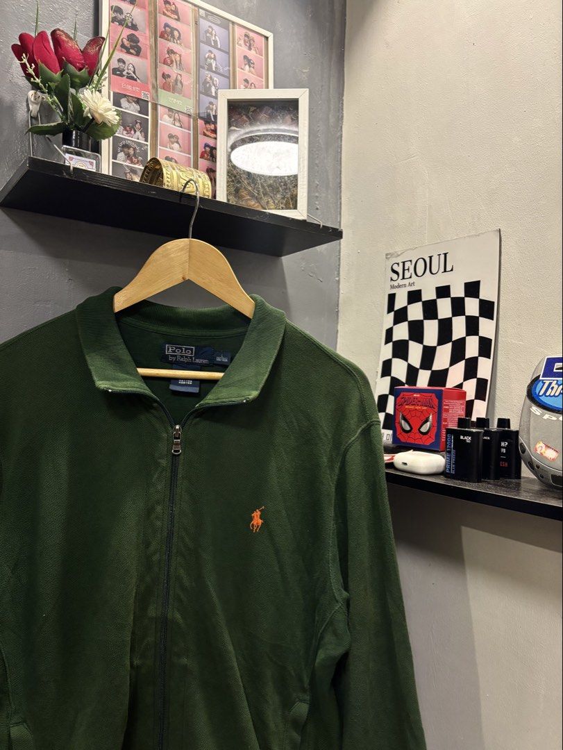 Polo by Ralph Lauren Green Zip-Up Jacket (Category: Coats, Jackets and Outerwear) located in Paranaque City. Submitted by mrthingsman (Listing ID 1460645983, Image 2). Description: Polo by Ralph Lauren Green Zip-Up Jacket 🧥 🌲 Size Large on tag🏷️ Dimension: •Width -22inches •Length -28inches Best fit Med to Xlarge Good size for men🫡 Great condition over all✨ Super Minimal discoloration.