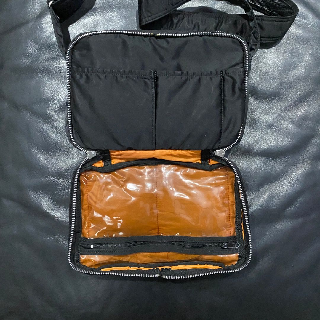 Porter Yoshida & Co. Shoulder Bag M (Category: Sling Bags) located in Antipolo. Submitted by bentakahitanoano (Listing ID 1460683018, Image 3). Description: The Porter-Yoshida & Co. Tanker Shoulder Bag is an iconic Japanese-made streetwear crossbody bag first introduced in 1983. Inspired by the U.S. Air Force MA-1 flight jacket, it is constructed using an original three-layer bonded fabric consisting of a nylon twill outer shell, a polyester cott