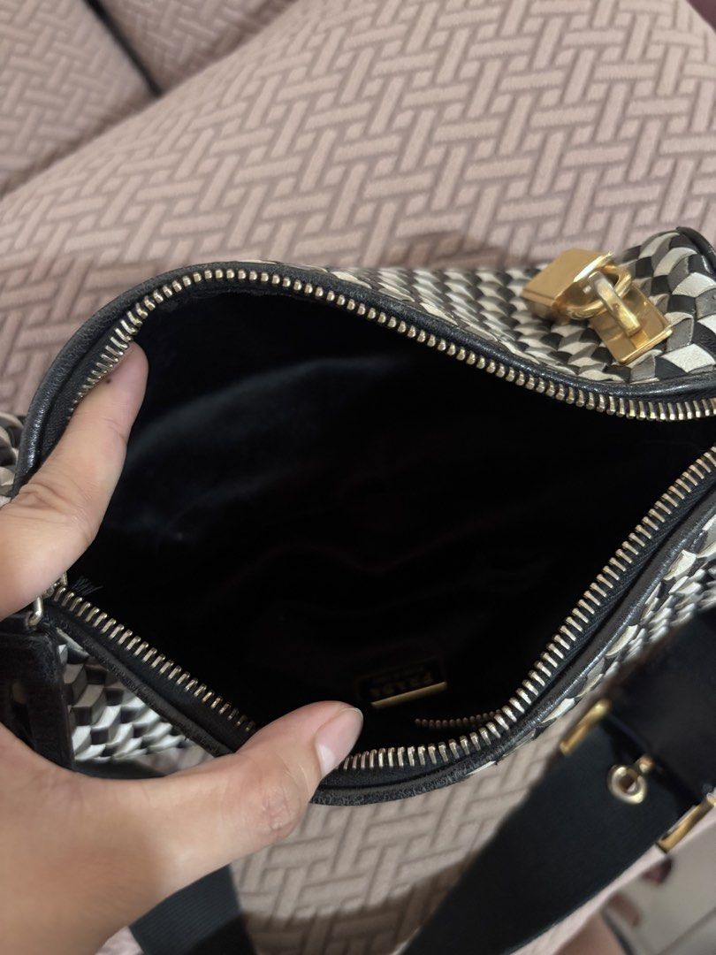 Prada black and white woven leather (Category: Luxury Bags & Wallets) located in Dagupan City. Submitted by raregrail.co (Listing ID 1460626494, Image 3). Description: .
