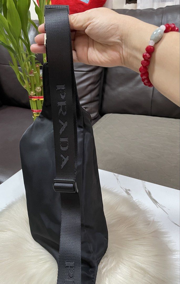 Prada Chest Bag (Unisex) (Category: Announcements) located in Mandaue City. Submitted by ludz_0246 (Listing ID 1460648754, Image 2). Description: Metal Logo Sexy R Logo Nylon in 21cm Adjustable Strap Unisex Actual Photo No flaw.