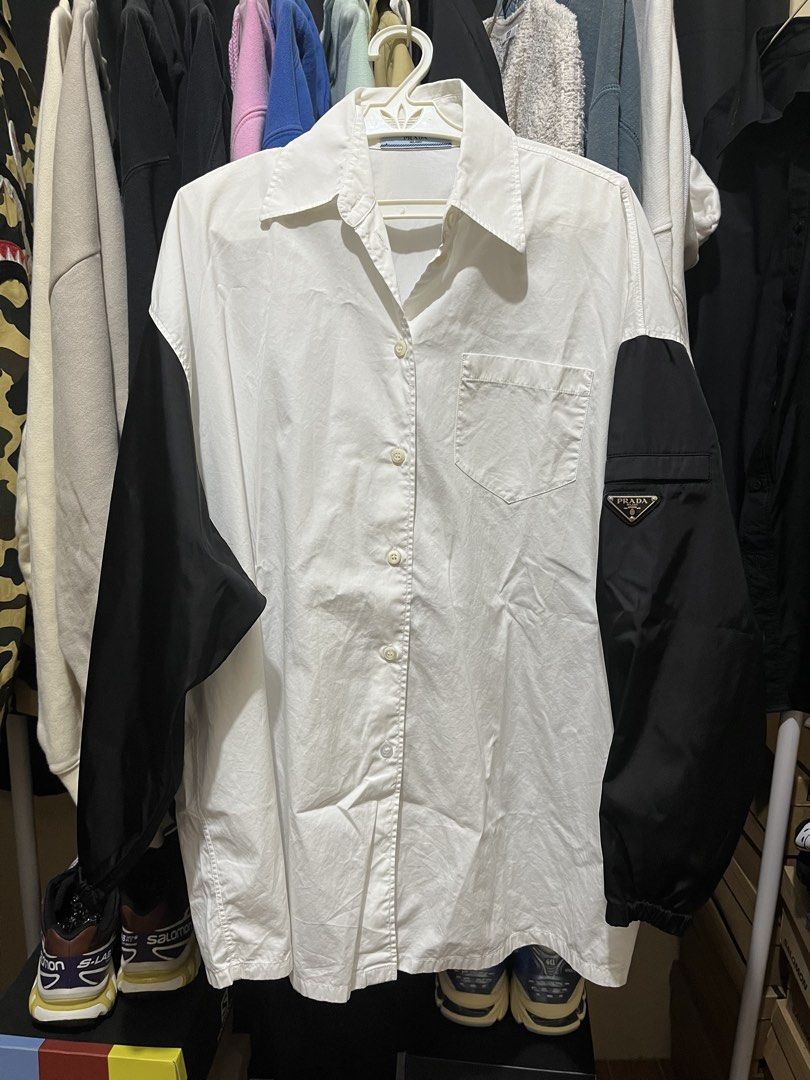 Prada Contrast Re-Nylon Poplin Button down (Category: Luxury Apparel) located in Mandaluyong City. Submitted by pepitomanaloto_777 (Listing ID 1460539497, Image 1). Description: Prada Contrast Re-Nylon Poplin Button down Worn once Size: XL Length: 29” Width: 24” Price: 22,000 Srp: around 120k Location Mandaluyong 📍 MOD: Grab/Lalamove/JNT 🚚 MOP: Gcash/Bdo Transfer 💳 No return/Exchange/Refund ❌ No COD/COP Transaction ❌ Need 50% DP for reservatio