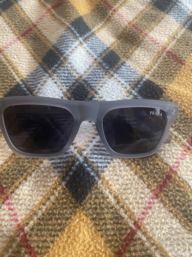 Prada Linea Rosa sunglasses (Category: Sunglasses & Eyewear) located in Paranaque City. Submitted by jorvilbac140555 (Listing ID 1460521118, Image 1). Description: Selling my brand new Prada Linea Rosa sunglasses (gift from Japan) Details: Metallic gray Lens Width: 54 mm (the horizontal width of each lens)Bridge Width: 18 mm (the distance between the two lenses over your nose)Temple Length: 146 mm (the length of the arm piece from the hinge to th