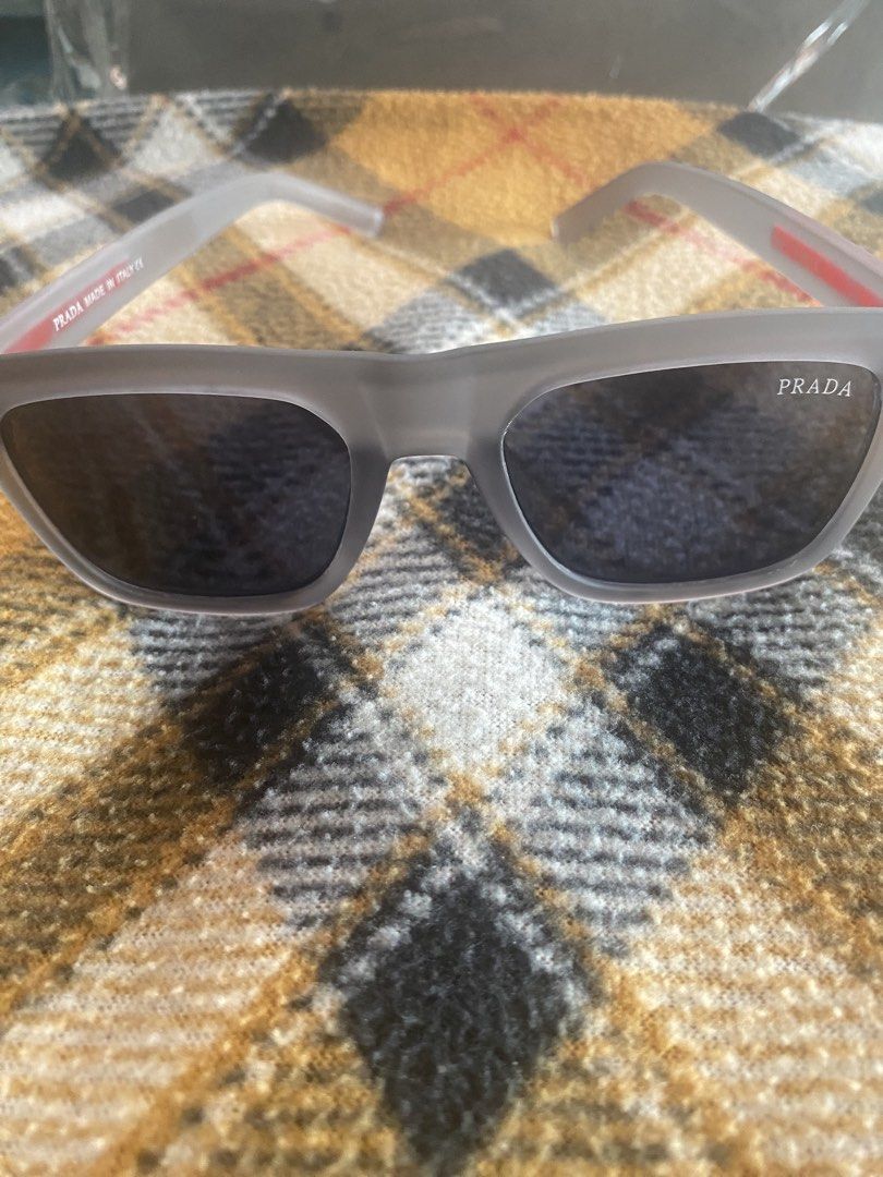 Prada Linea Rosa sunglasses (Category: Sunglasses & Eyewear) located in Paranaque City. Submitted by jorvilbac140555 (Listing ID 1460521118, Image 3). Description: Selling my brand new Prada Linea Rosa sunglasses (gift from Japan) Details: Metallic gray Lens Width: 54 mm (the horizontal width of each lens)Bridge Width: 18 mm (the distance between the two lenses over your nose)Temple Length: 146 mm (the length of the arm piece from the hinge to th