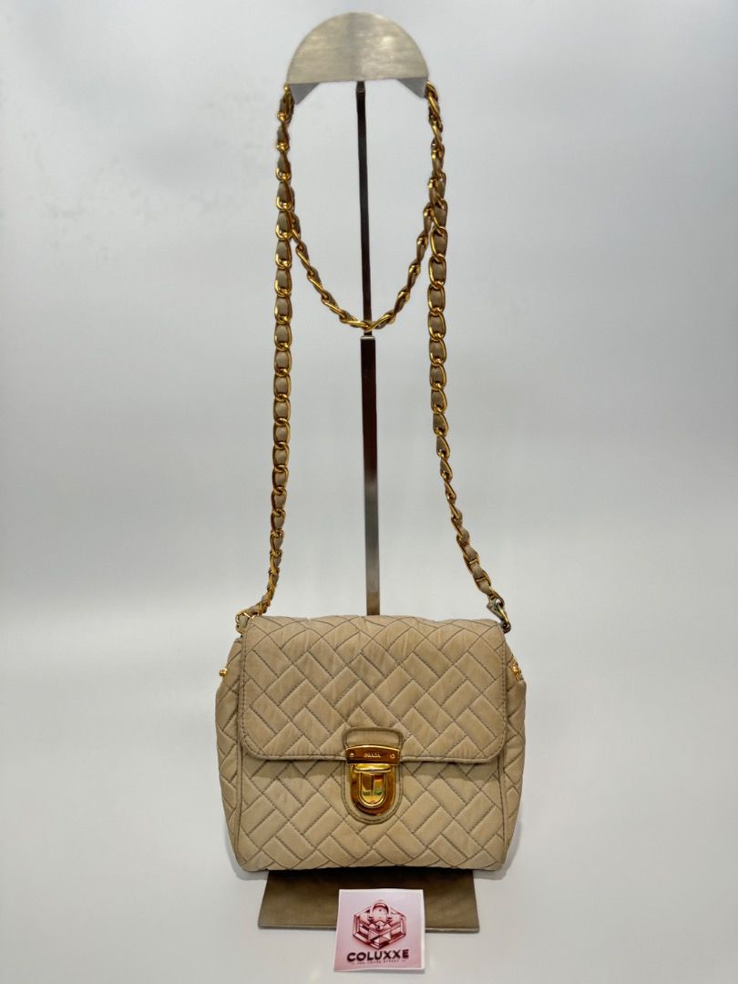 Prada nylon sling (Category: Luxury Bags & Wallets) located in Las Pinas. Submitted by coluxxexprelovedstreet1828 (Listing ID 1460621232, Image 1). Description: Rank AB minus Signs of use on nylon body Minimal tarnish Lock sometimes is hard to open Guaranteed original Negotiable No to meet ups Lalamove/Grab or J&T shoulder by buyer Offer thru chat.