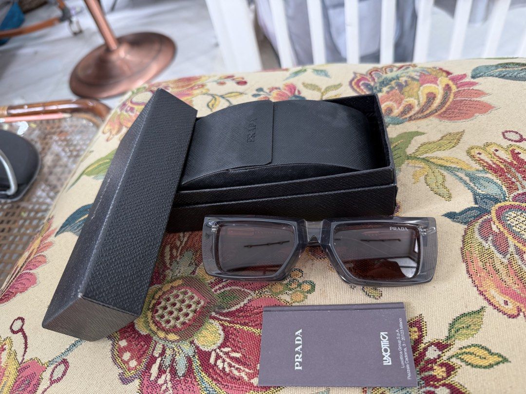 Prada PR24Y 5521 19B 5SO Sunglasses (Category: Sunglasses & Eyewear) located in Batangas. Submitted by kontin (Listing ID 1460530341, Image 2). Description: Prada PR24Y 5521 19B 5SO Sunglasses Bought at Japan bazaar Condition: 8.5/10 Men/Unisex Solid thick Acetate frame with still inside .