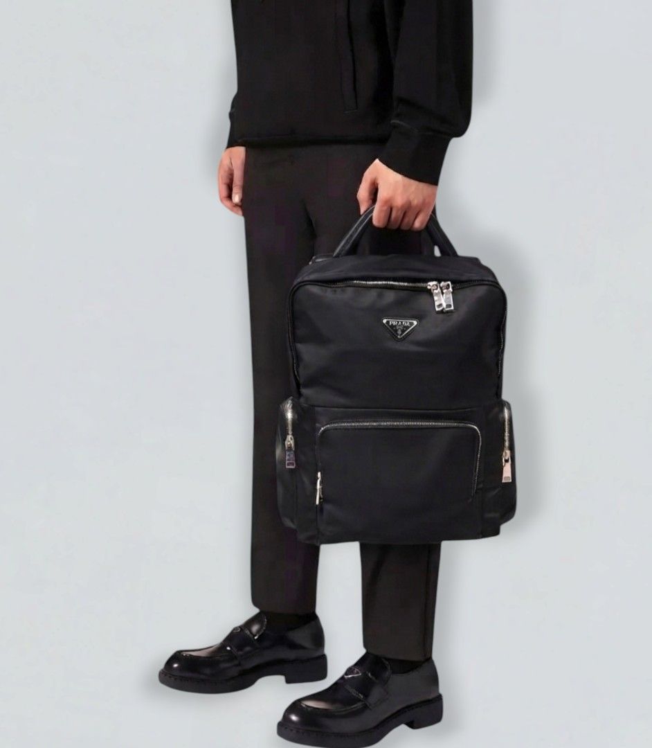 PRADA RE-NYLON BACKPACK (Category: Luxury Bags & Wallets) located in Rizal. Submitted by rcthriftcollection (Listing ID 1460581666, Image 2). Description: PRADA RE-NYLON BACKPACK Excellent / Asnew No issue DM📥📥📥 Location: MONTALBAN, RODRIGUEZ, RIZAL .