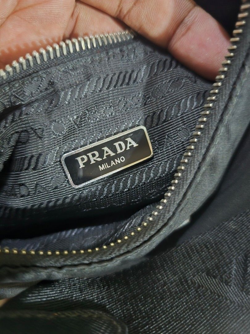 Prada Re-Nylon Mini Bag with Pouch (Category: Luxury Bags & Wallets) located in Davao. Submitted by arvinaboab04229 (Listing ID 1460559173, Image 3). Description: - Authentic Prada nylon bag - Includes matching mini pouch - Adjustable strap for comfortable wear - Secure zipper closure - Interior features Prada branding - Made in Italy and China - Ideal for carrying your daily essentials - inclusion Dustbag .