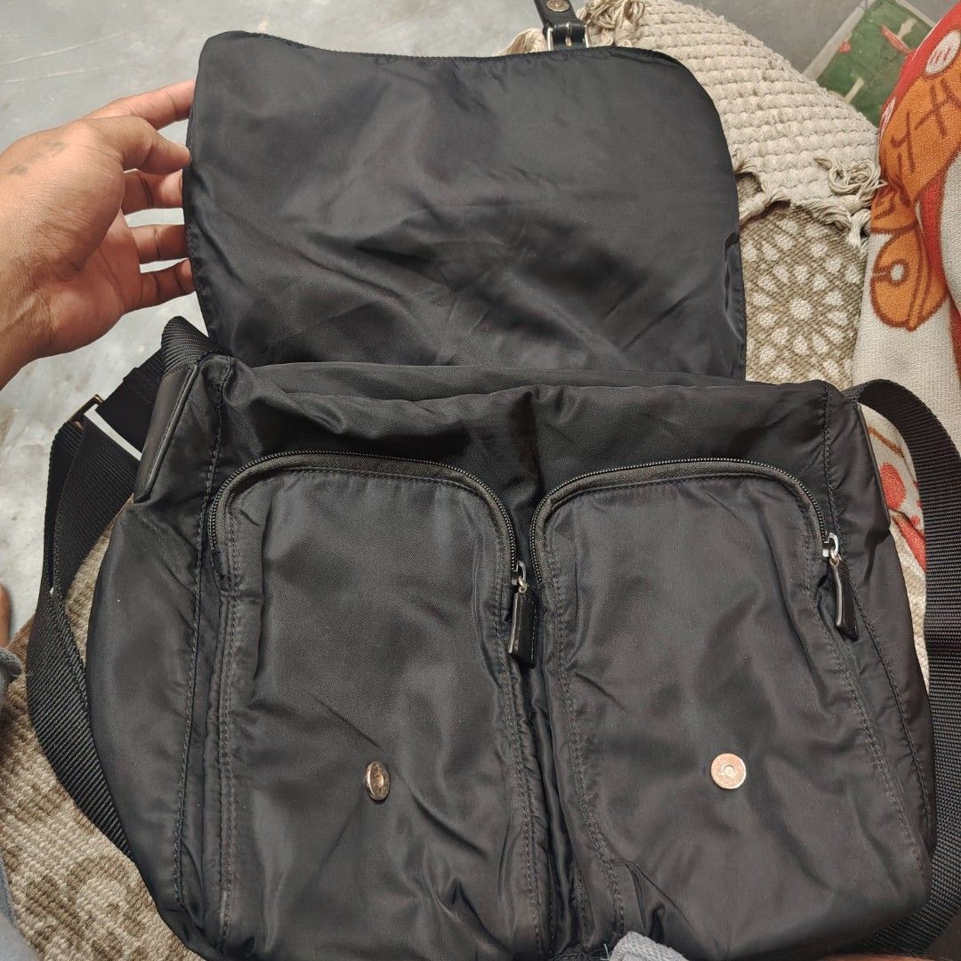 Prada Sling Re nylon (Category: Luxury Bags & Wallets) located in Daraga. Submitted by flip2fit (Listing ID 1460635626, Image 3). Description: No white tag plss self Authenticate Excellent to New Condition.