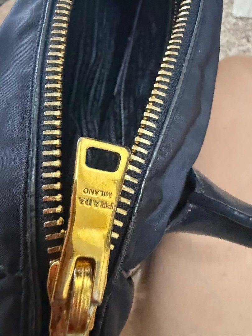 Prada Tessuto Nylon Navy Blue Bag (Category: Luxury Bags & Wallets) located in Makati City. Submitted by staraby (Listing ID 1460709918, Image 2). Description: - Authentic Prada Tessuto Nylon Bag - Color: Navy Blue - Versatile: Ideal for everyday use, work, or special occasions - Includes original dust bag - Comes with authenticity card - A classic and stylish Prada piece.