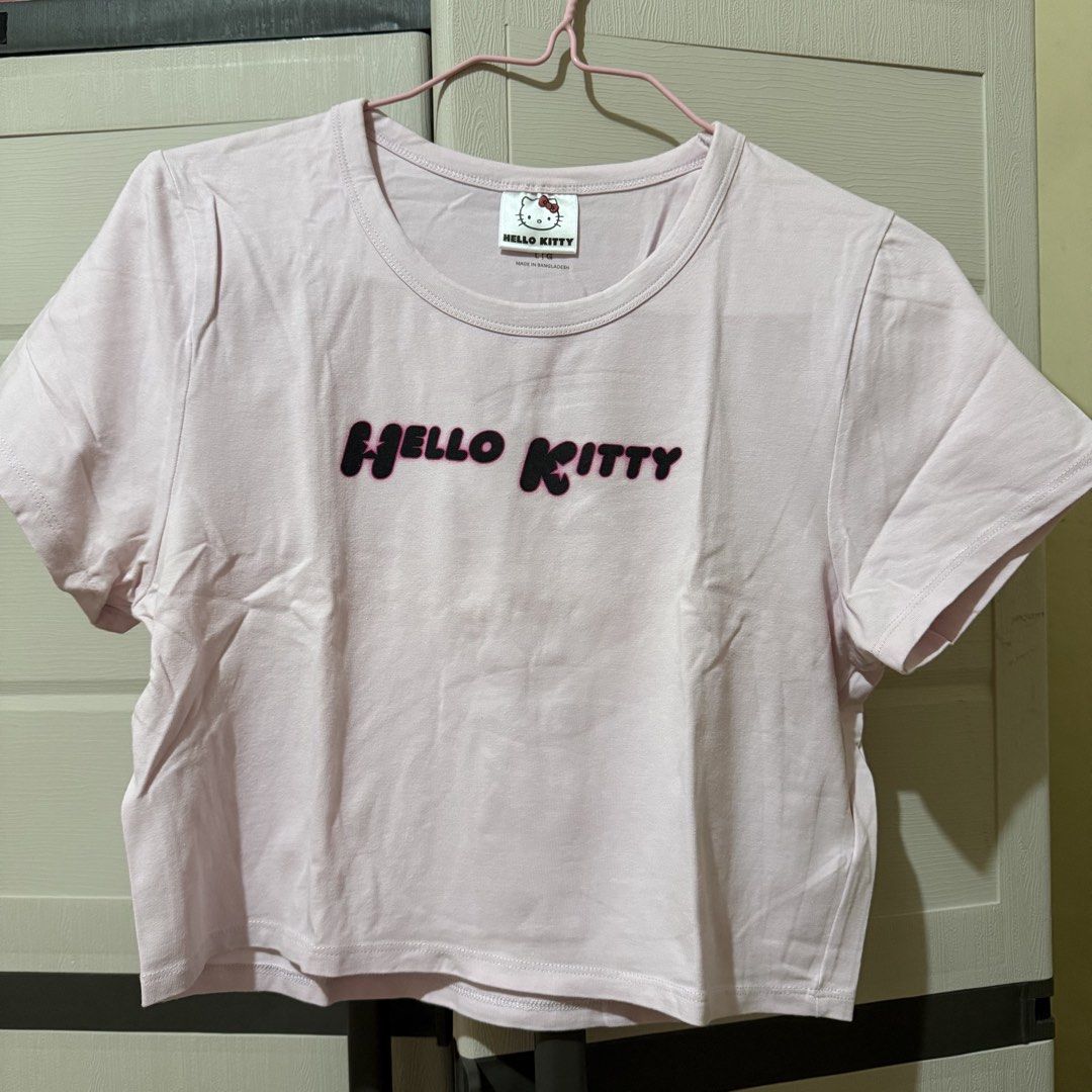 [Preloved] Cotton On x Hello Kitty Micro Tee (Category: Shirts) located in Manila. Submitted by ultsaida (Listing ID 1460709182, Image 1). Description: Cotton On x Hello Kitty Cropped Top Shirt – Size: L | Can fit M-XL – Condition: Like new – Wore once only. – Preloved, manage your expectations. MOD: J&T / LBC (Buyer's preference and buyer will shoulder the shipping fee) MOP: Gcash, Maribank, or BDO Loc: Bataan.