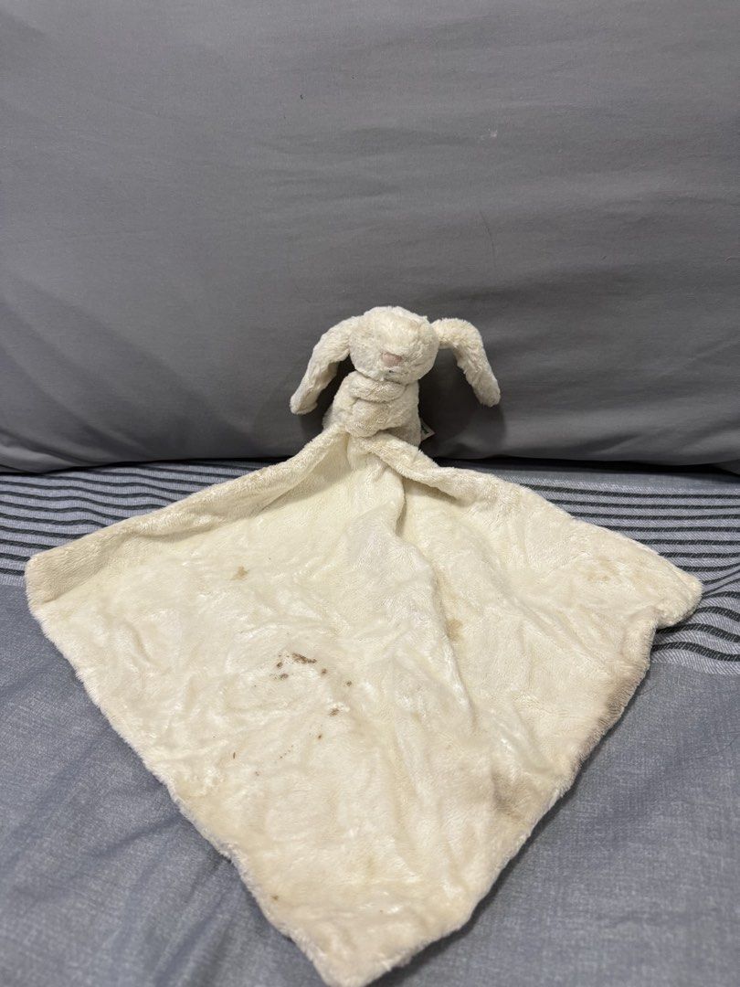 Preloved Jellycat Bunny Comforter Blanket (Category: Bedding & Towels) located in Manila. Submitted by kunehoe (Listing ID 1460543188, Image 1). Description: - Cream colored bunny comforter - Super soft and cuddly - Plenty of life left for a new little one to enjoy!.