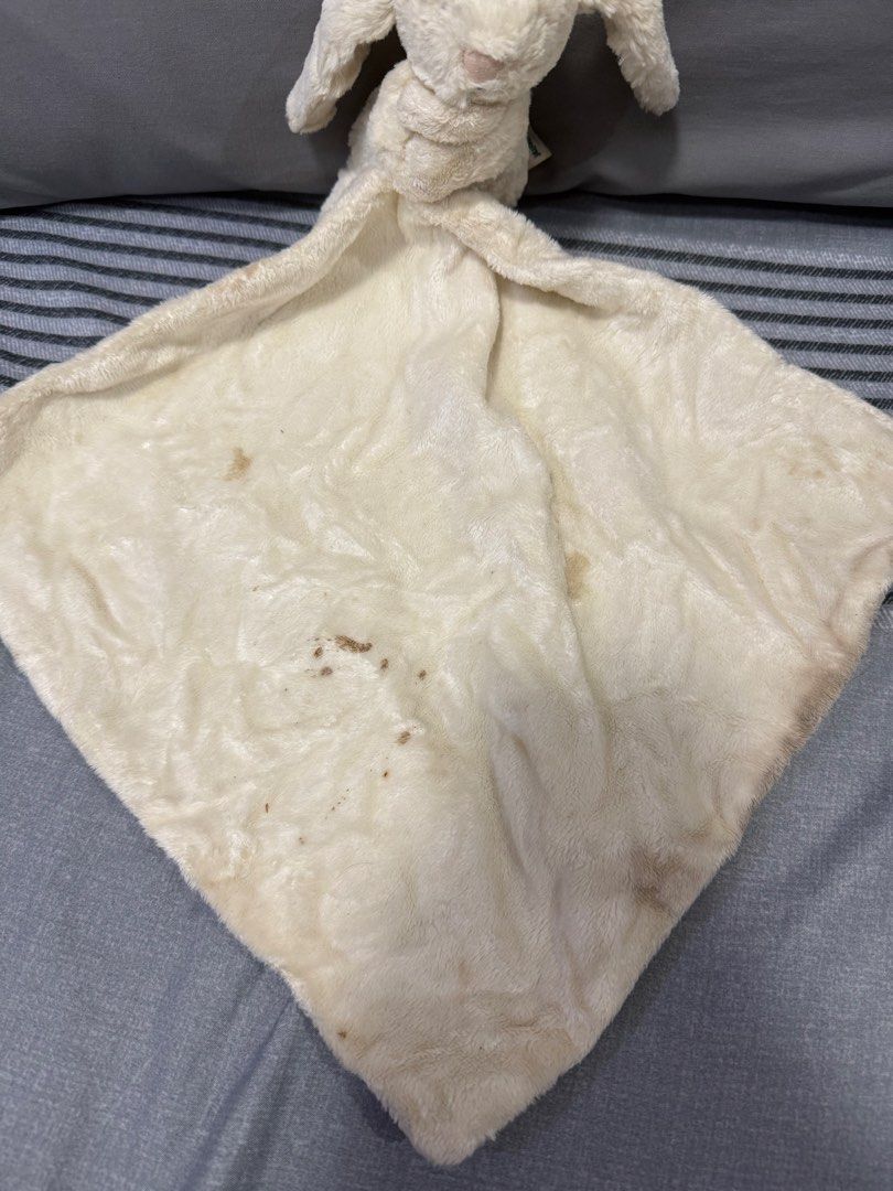 Preloved Jellycat Bunny Comforter Blanket (Category: Bedding & Towels) located in Manila. Submitted by kunehoe (Listing ID 1460543188, Image 3). Description: - Cream colored bunny comforter - Super soft and cuddly - Plenty of life left for a new little one to enjoy!.