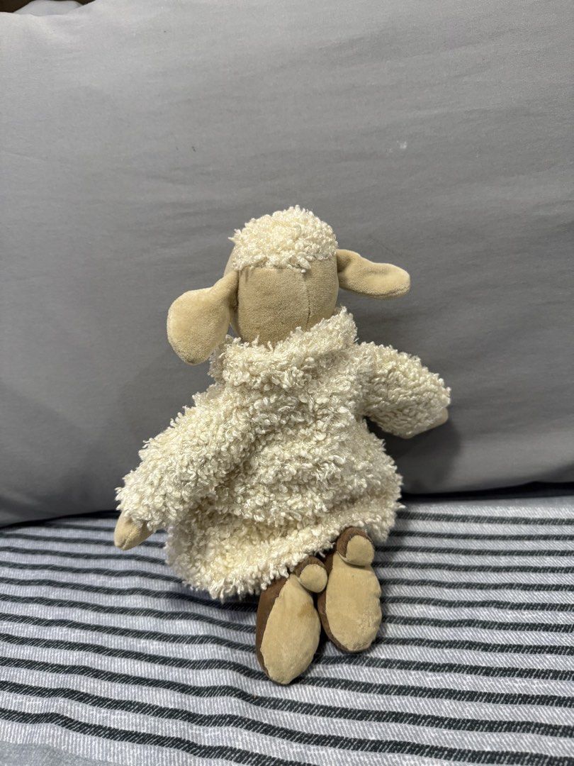 Preloved Jellycat Sheep Plush Toy (Category: Plushies & Soft Toys) located in Manila. Submitted by kunehoe (Listing ID 1460543381, Image 2). Description: - Adorable Jellycat sheep plush toy - Features a fluffy cream jacket and brown boots - Highly detailed design - Ideal for children and collectors alike - Approximately 12 inches in height.