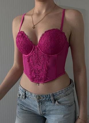 Primark Hotpink Corset (Category: Others Tops) located in Bacoor. Submitted by pinkzloverz222 (Listing ID 1460525466, Image 2). Description: Fit small-medium 34D bust Primark hot pink underwire corset top features floral lace detailing and adjustable straps. may washable stain lang (check last photo) still in good condition ₱150+sf.