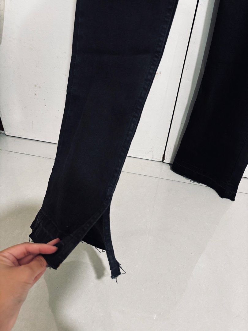 Pull & Bear Black Highwaisted Flare Jeans (Category: Jeans) located in Manila. Submitted by dianafayesimbre (Listing ID 1460709737, Image 3). Description: - Brand: Pull & Bear - Style: Black flare jeans - Closure: Button fly - Hem: Raw hem with ankle slit detail - Material: Comfortable denim - Versatility: Great for dressing up or down - Fits size 27-28 waistline - Length 43 inches.