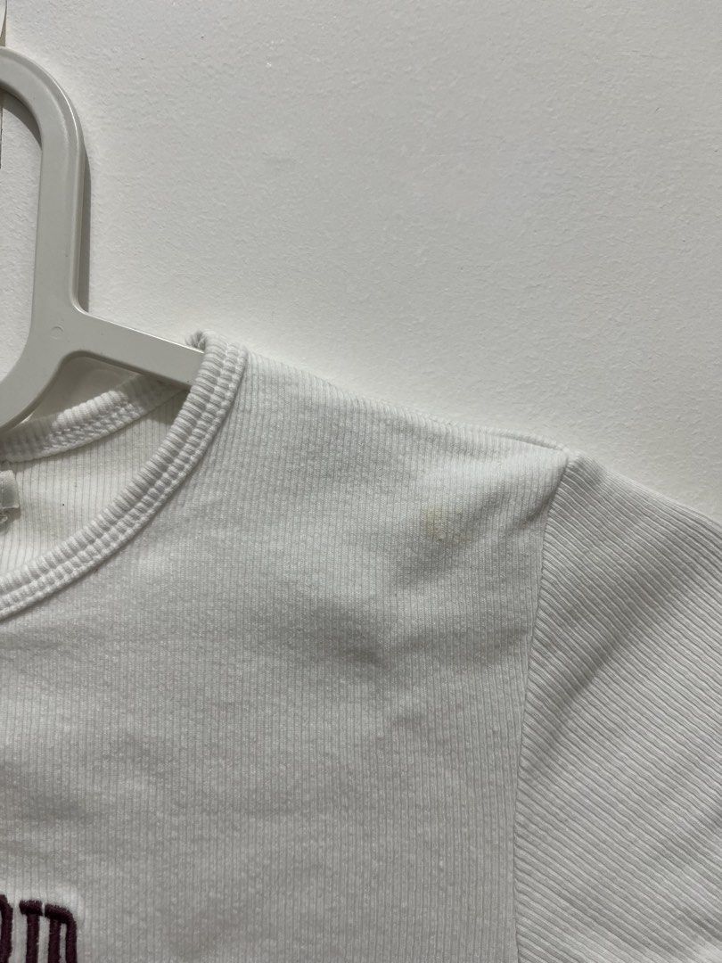 Pull & Bear White Ribbed Crop Top Sunset Strip LA (Category: Shirts) located in Manila. Submitted by jonalainea95245 (Listing ID 1460708095, Image 2). Description: - Brand: Pull & Bear - Style: White ribbed crop top - Graphic: 'Sunset Strip Est 1971 Los Angeles, CA' - Features: Short sleeves, crew neck - Condition: Small stain on the right shoulder area (please check photos for details) RFS: decluttering Location: Malabon.