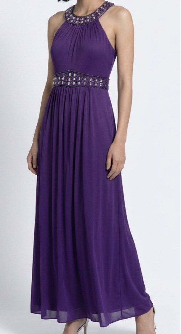 Purple formal dress (Category: Evening dresses & gowns) located in San Juan City. Submitted by cometsanythingtosell (Listing ID 1460536682, Image 1). Description: Purple long dress with beads accent.