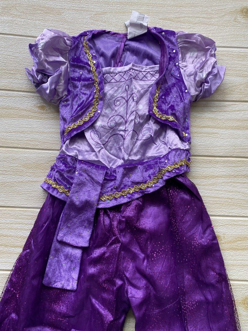 purple Shimmer costume (Category: Babies & Kids Fashion) located in Cebu City. Submitted by yjainani (Listing ID 1460527576, Image 2). Description: purple Shimmer costume from Shimmer and Shine featuring sparkly sheer sleeves and gold trim.