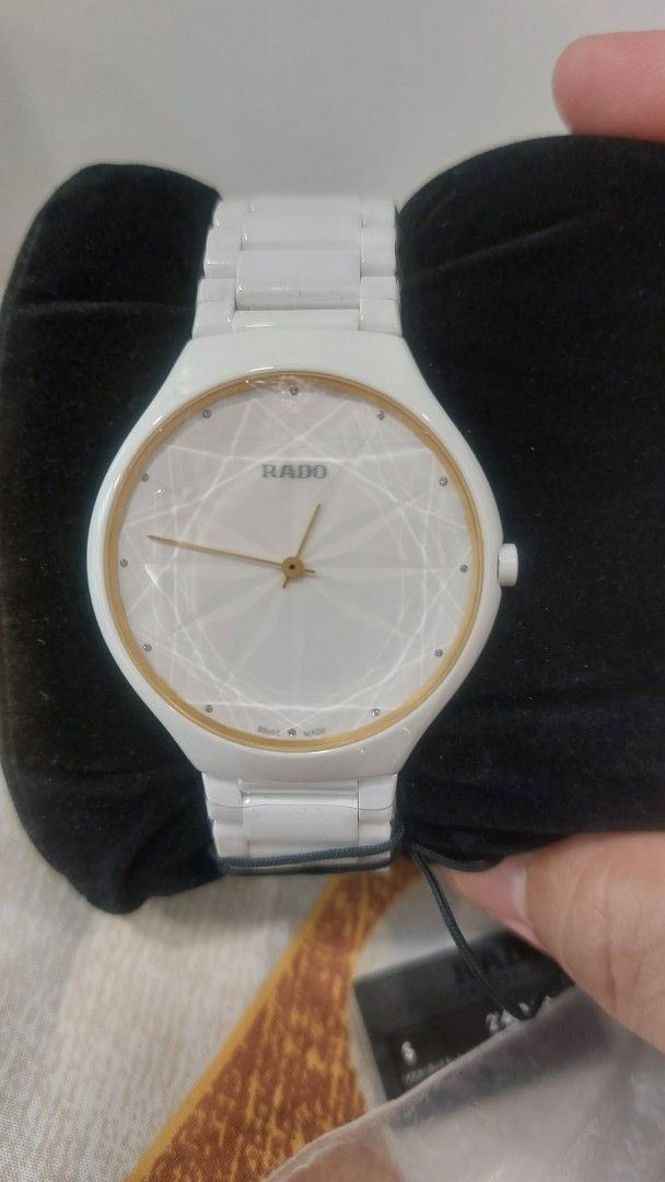 Rado True Thinline Gem (Category: Luxury Watches) located in Quezon City. Submitted by gorgeous__ (Listing ID 1460630429, Image 1). Description: Rado True Thinline Gem * Brand New / Never Worn * Opened only for customs checking * White High-Tech Ceramic * Swiss Made * Quartz Movement * Sapphire Crystal * Gem/diamond details * With Rado booklets and Precious Stones Certificate * Complete set .