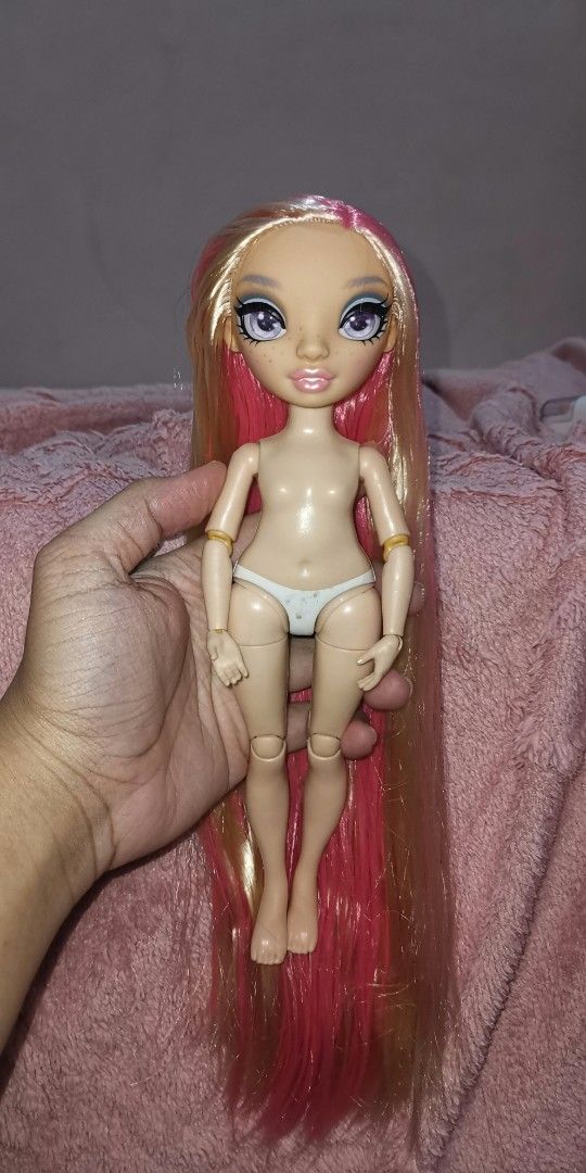 Rainbow High Margot De Perla Doll Rerooted (Category: Figurines & Statues) located in Subic. Submitted by kennyyuh_ (Listing ID 1460558782, Image 2). Description: - Rerooted with saran hair - Comes with her accessories except sunglasses - Tight articulation - Low price for sure buyer Issues: - Yellowed joints.