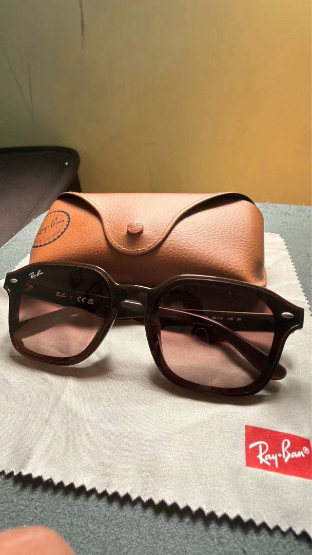 Ray-Ban Sunglasses with Case (Category: Sunglasses & Eyewear) located in Bacoor. Submitted by ayayesha (Listing ID 1460604748, Image 2). Description: - Authentic Ray-Ban sunglasses - Comes with original brown leather case and cleaning cloth - Dark brown tortoise shell frame - Gradient tinted lenses - Original tag from SM Store included - Great pair of shades.